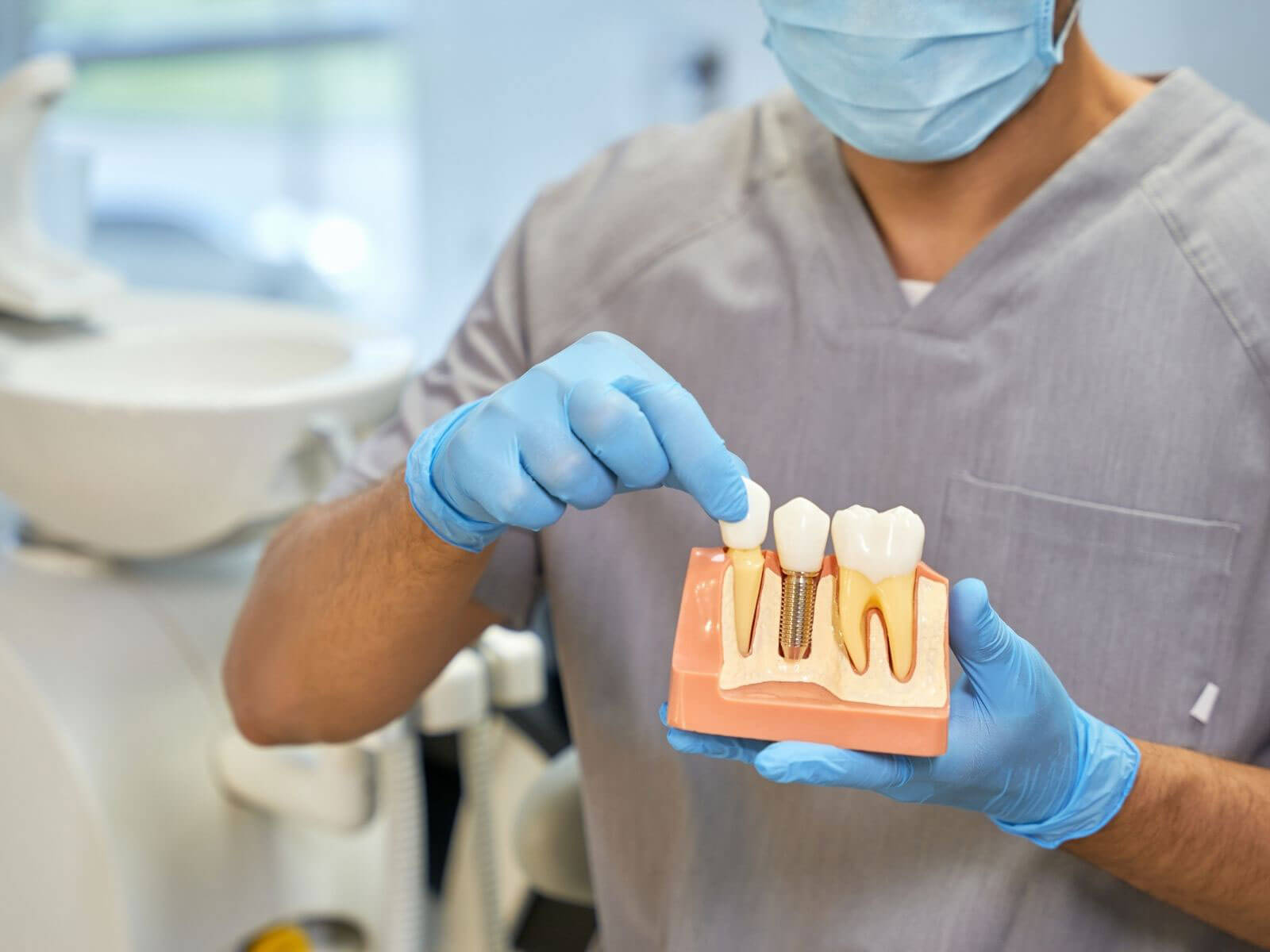 Dental Implant vs. Bridge: Which One to Choose